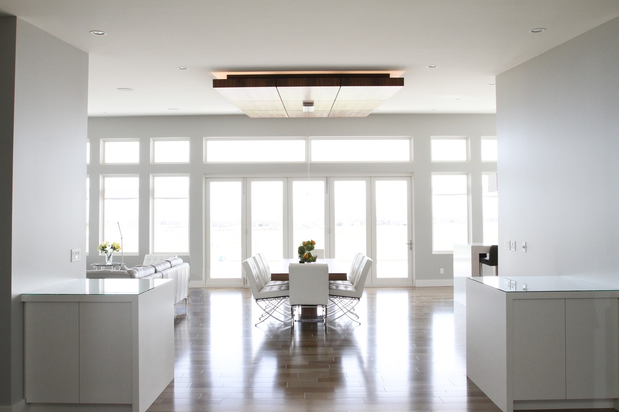 Open-plan living space with custom cabinetry and millwork built by The Interior